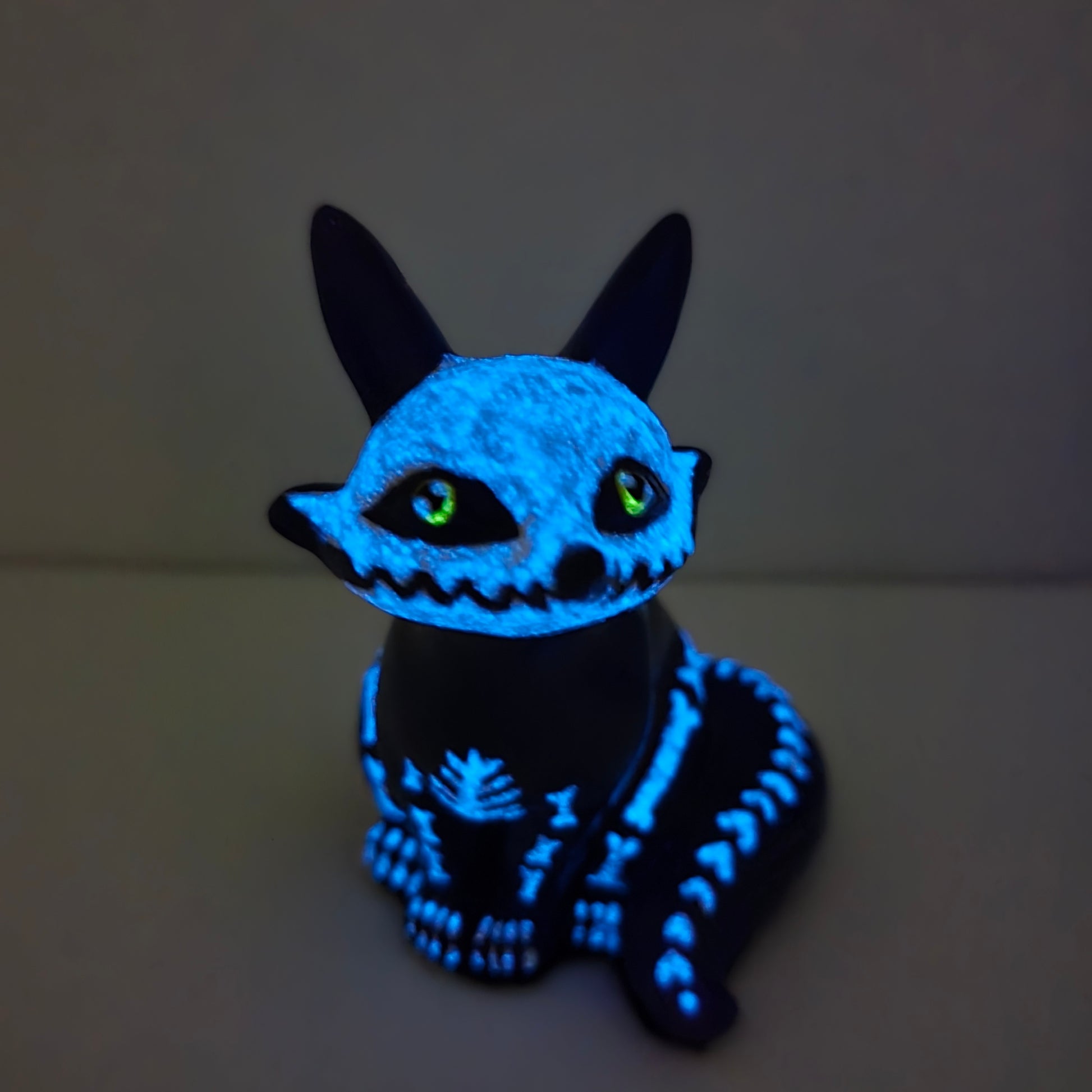 Fox kit figure sitting, glowing in the dark (cute and whimsy halloween figure)