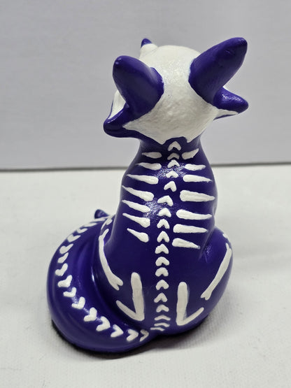 back of cute halloween fox figure skeleton, sitting 