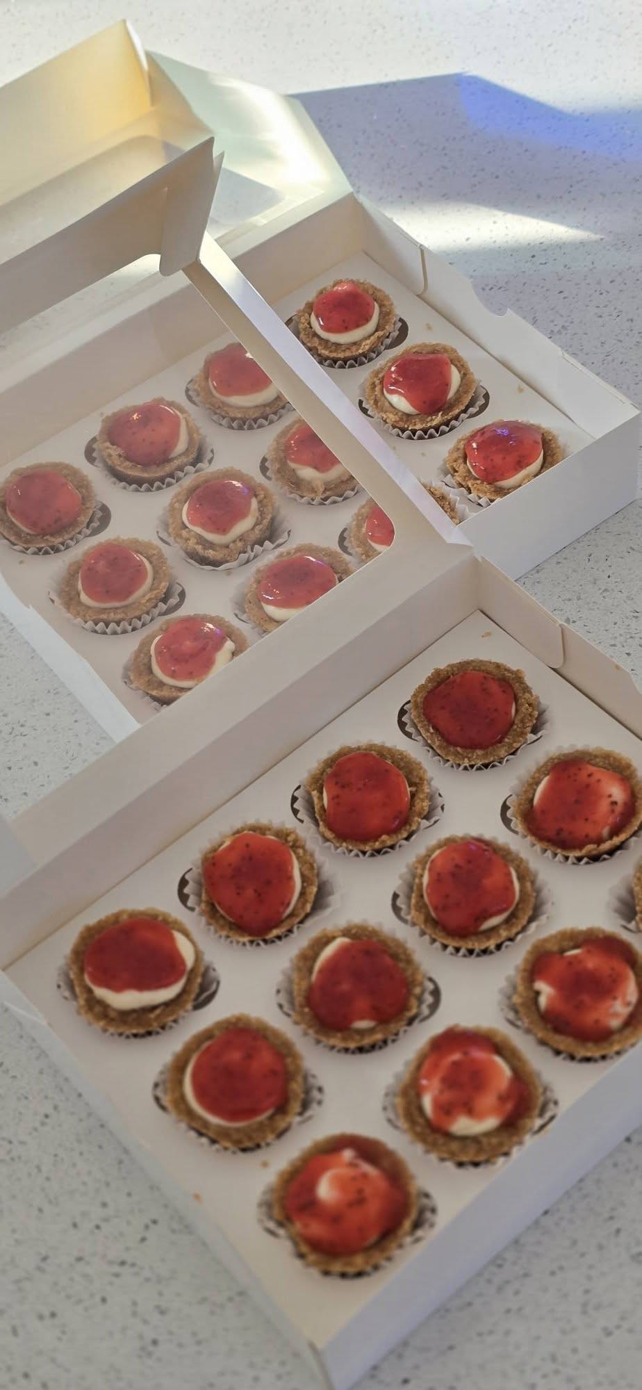Boxes of strawberry Cheesecake Cuties with graham cracker crust