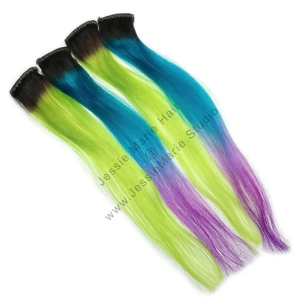 custom colored clip in human hair extensions - brown root with aqua teal blue and violet purple / pink colors