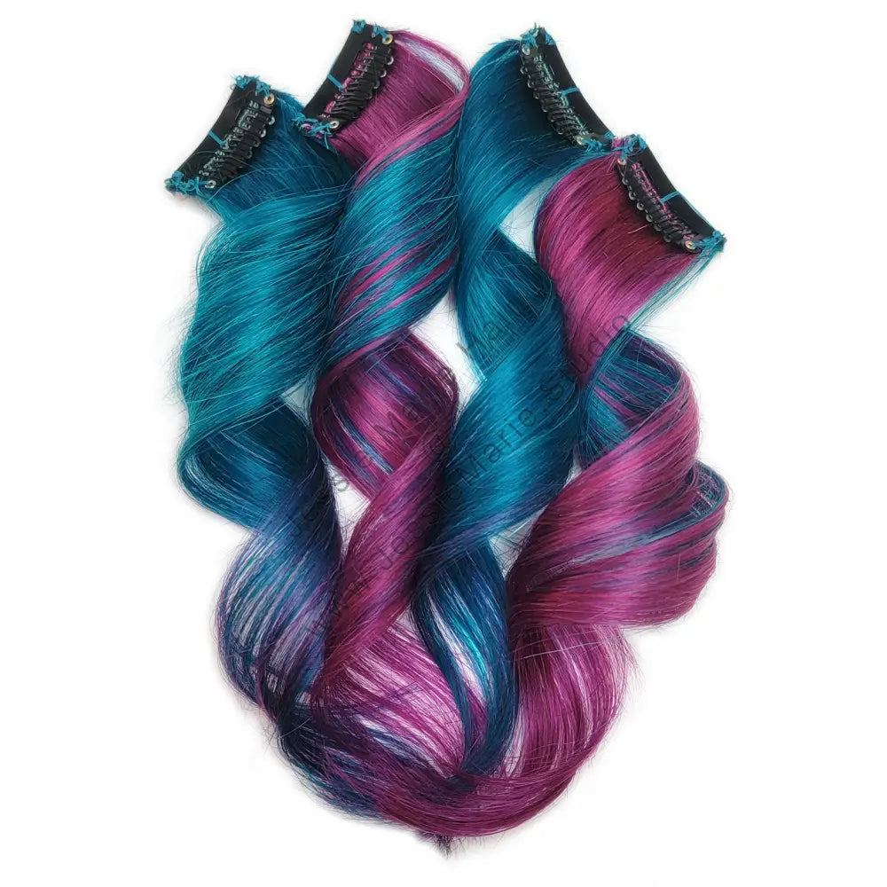 teal and pink colored ombre hair