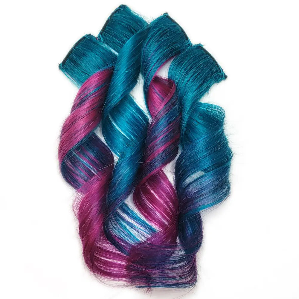 pink and teal colored ombre hair