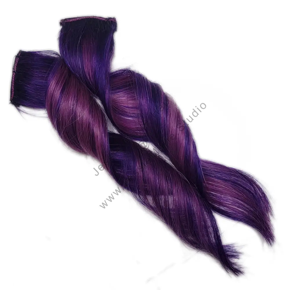 dark purple with light purple highlights for dark brown. black and blonde hair