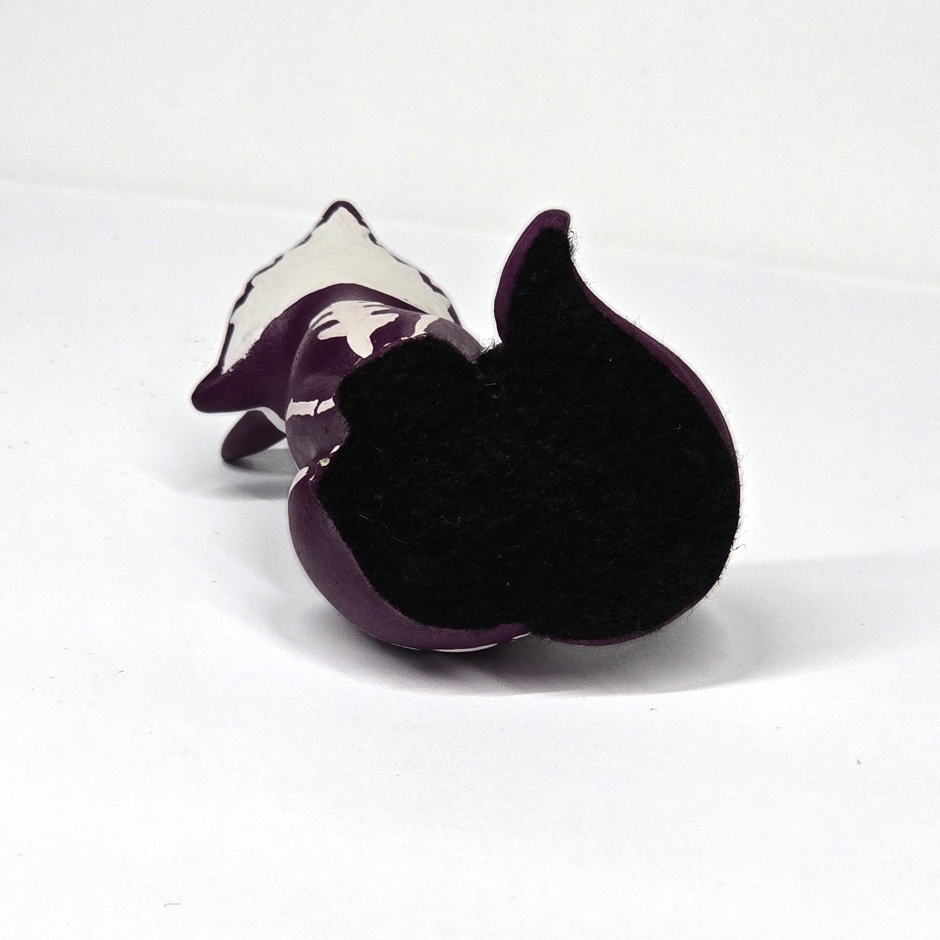 felt protector on the bottom of fox/puppy figure