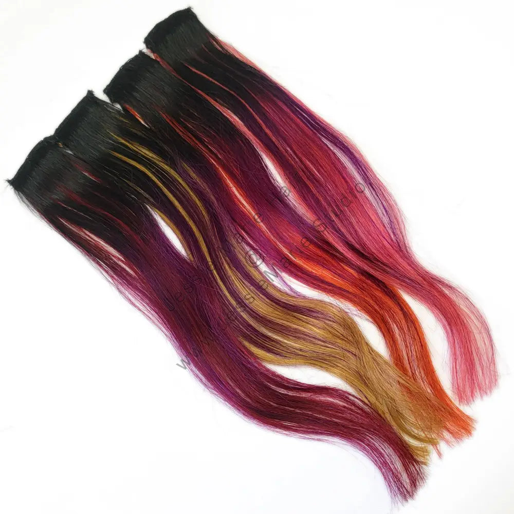fire colored ombre hair with purple pink orange and yellow highlights