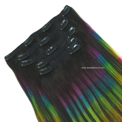 Rainbow Colored Clip in Human Hair Extensions on black hair