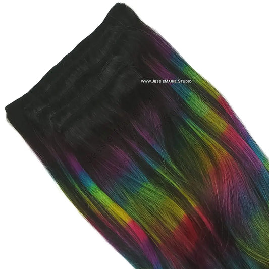 Rainbow Colored Clip in Human Hair Extensions on black hair