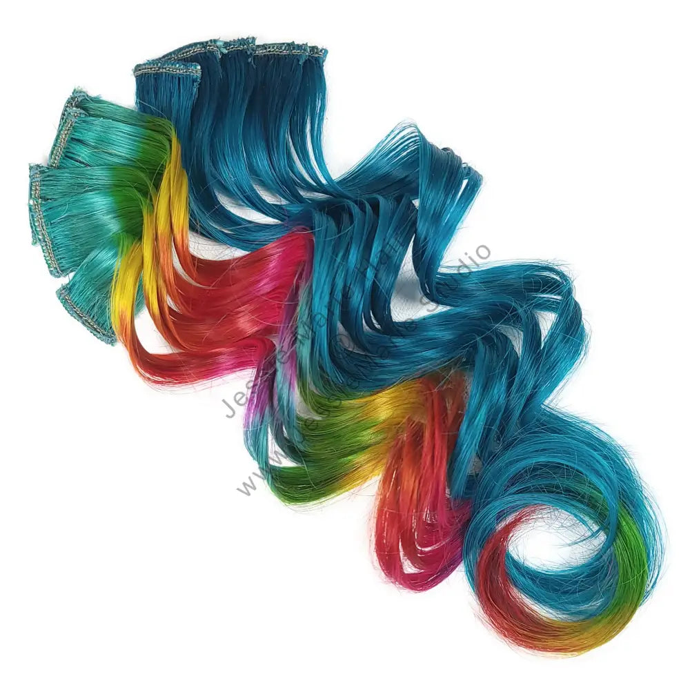 aqua blue hair with rainbow highlights
