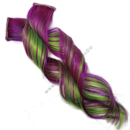 purple and green colored hair